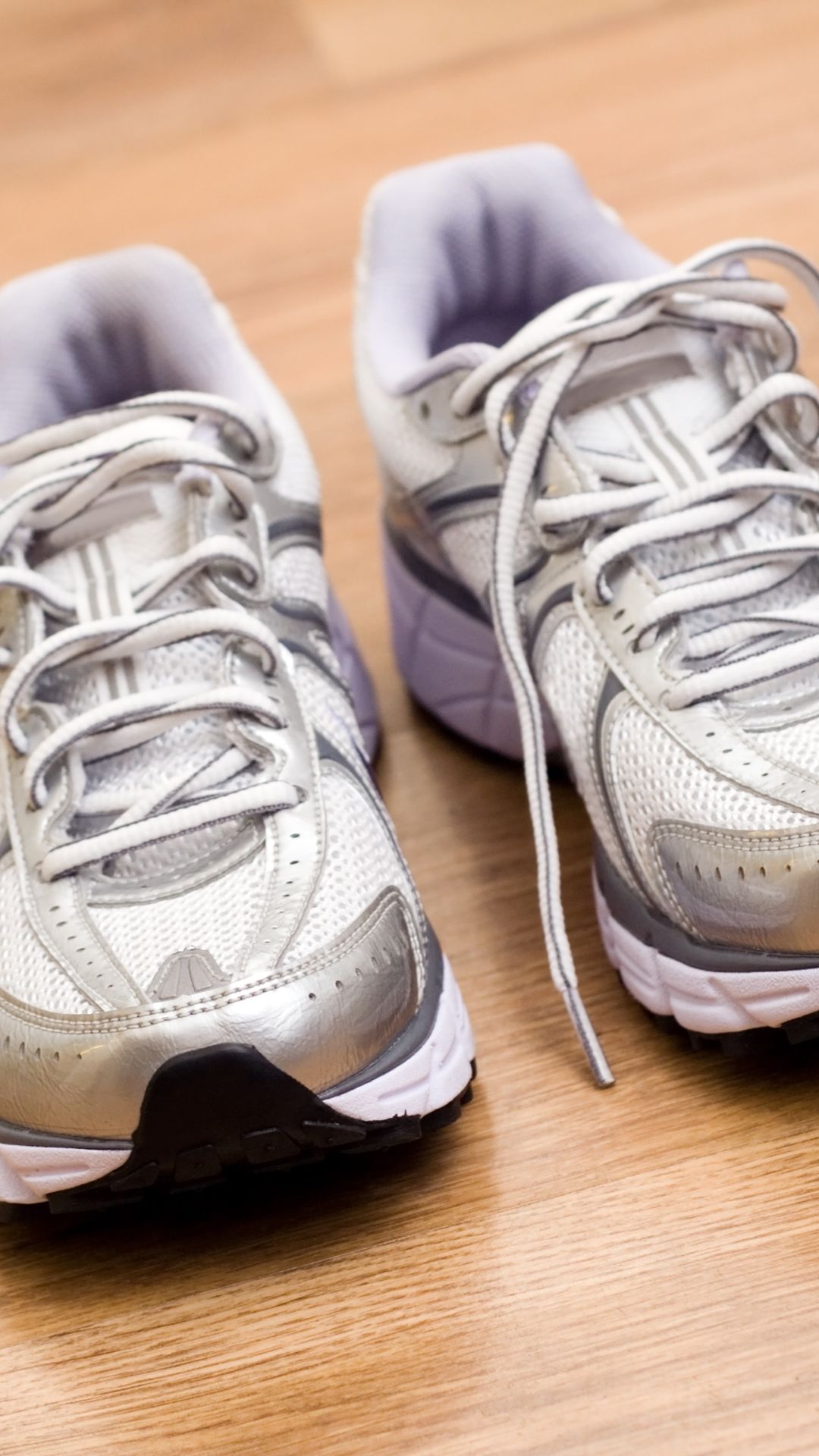 photo of a pair of white tennis shoes